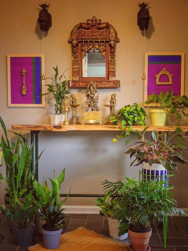 One look at Thenmozhi's home will transport you to India! With greenery and temple elements, this South Indian Home in USA glows with abundance and piety.