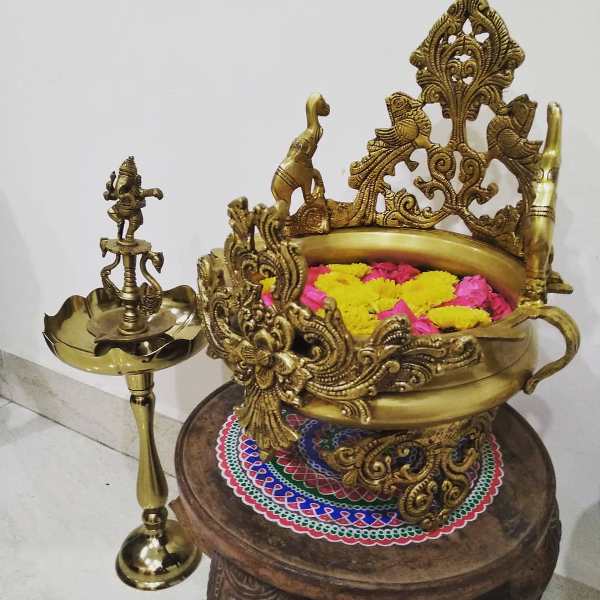 Traditional Paintings made by the home owner herself, along with antique brass artefacts make this Chennai Home truly Personal and Charming!