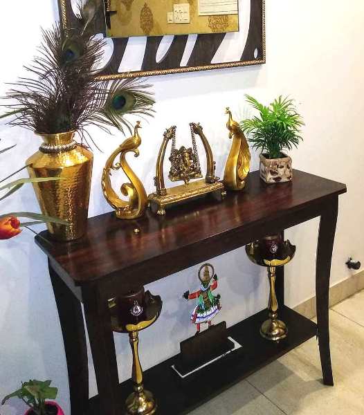 Traditional Paintings made by the home owner herself, along with antique brass artefacts make this Chennai Home truly Personal and Charming!