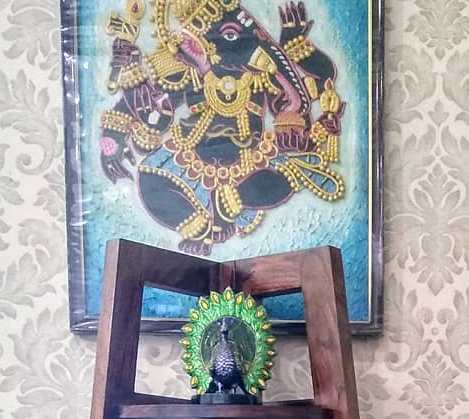 Traditional Paintings made by the home owner herself, along with antique brass artefacts make this Chennai Home truly Personal and Charming!
