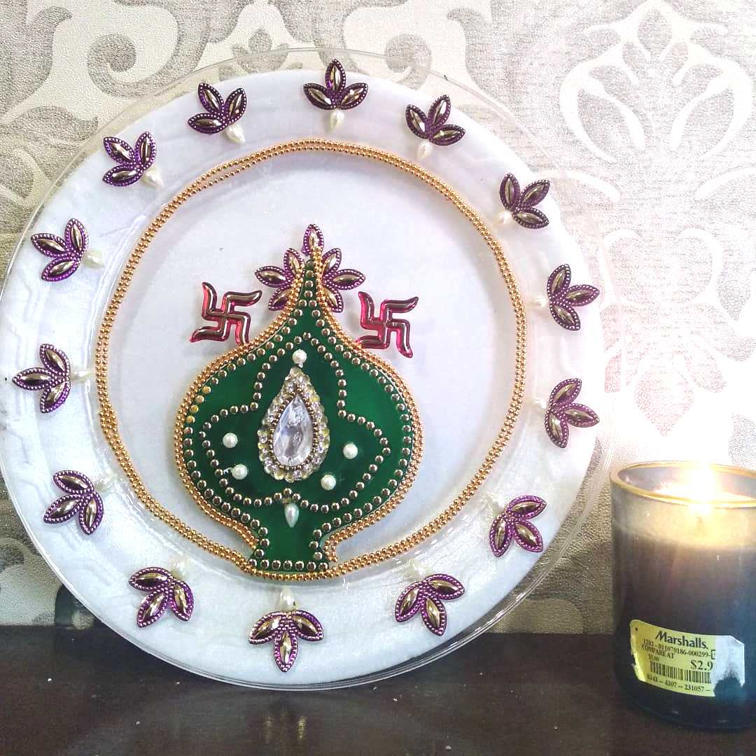 Traditional Paintings made by the home owner herself, along with antique brass artefacts make this Chennai Home truly Personal and Charming!