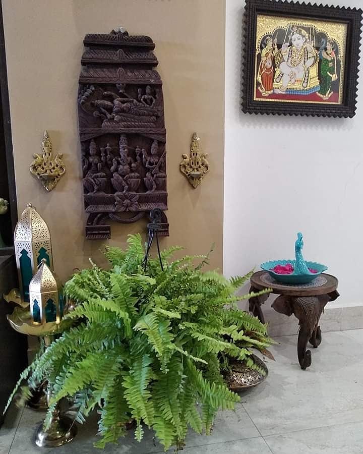 Traditional Paintings made by the home owner herself, along with antique brass artefacts make this Chennai Home truly Personal and Charming!