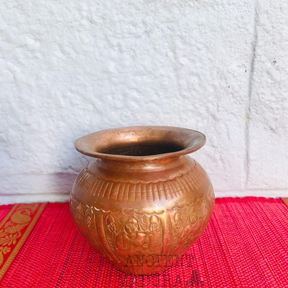 Copper pot with engravings also called a copper chombu