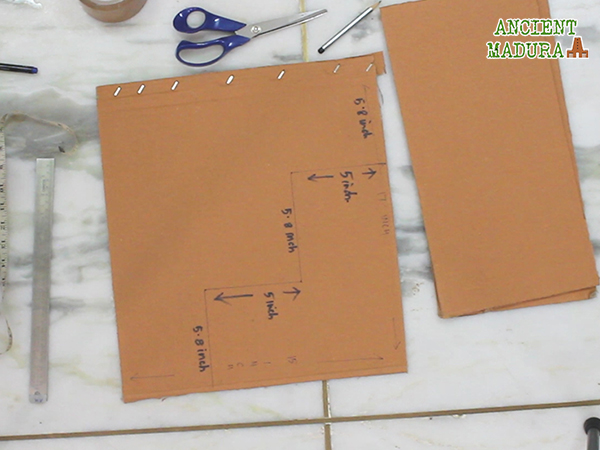marking the measurements on the cardboard