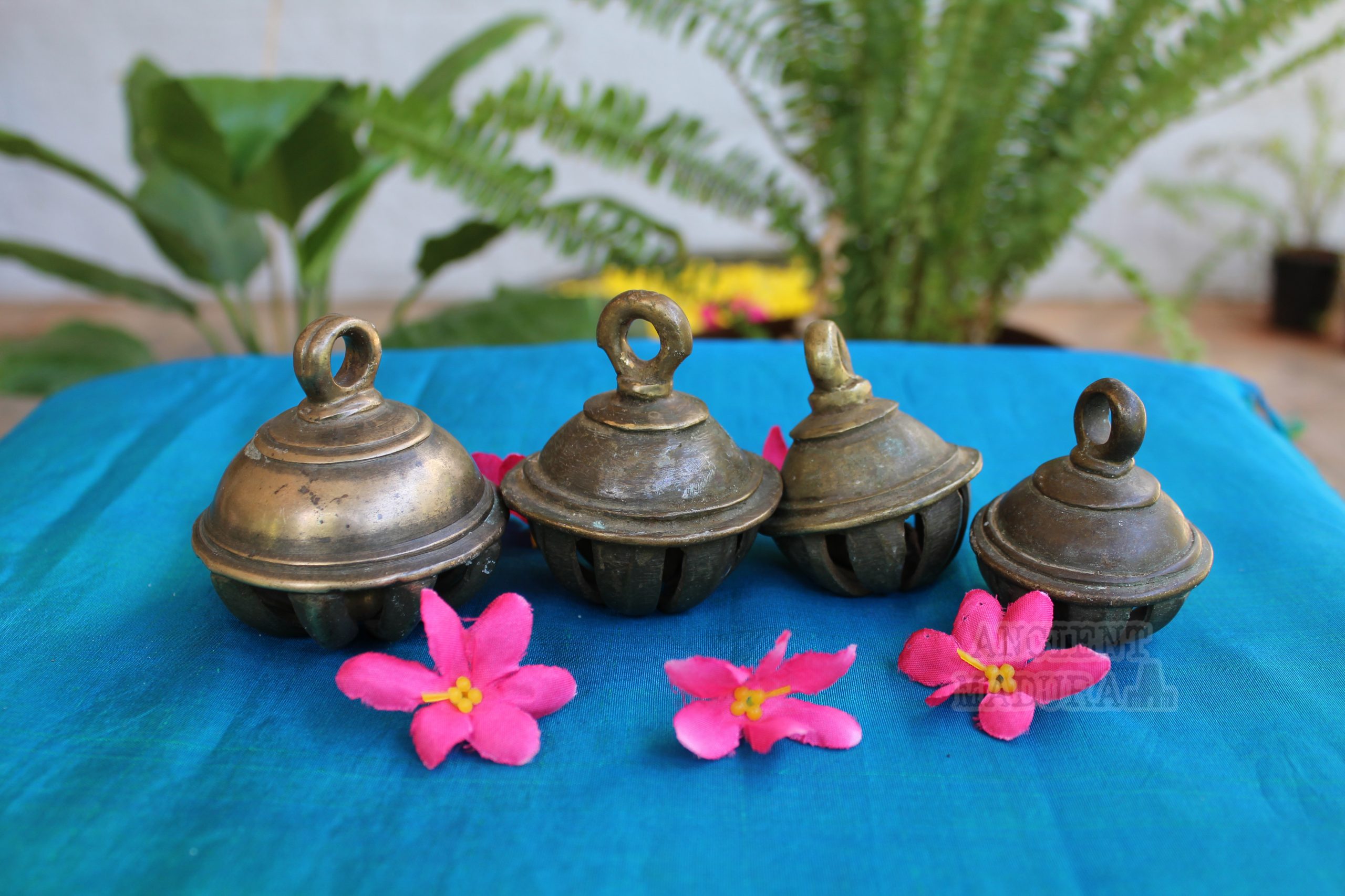 Four antique bronze elephant bells