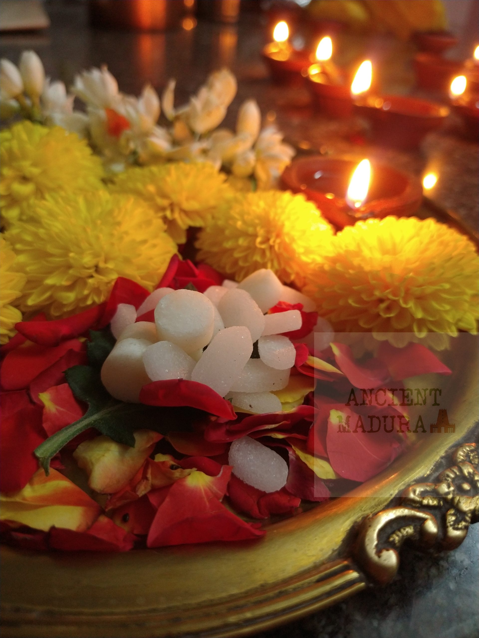Pooja plate with flowers and camphor for Diwali