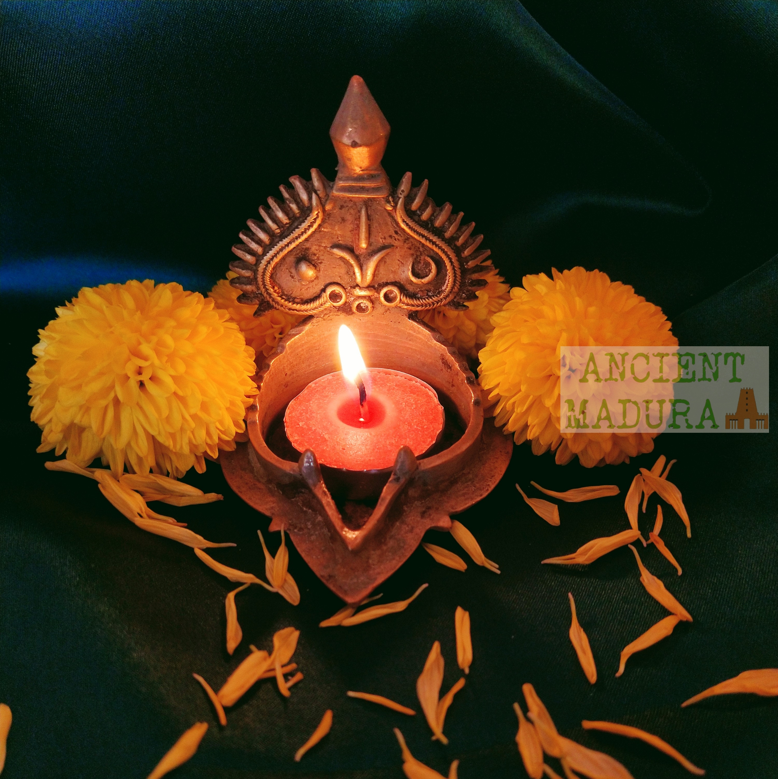 Vishnu floor lamp with tealight candle in the center for Diwali