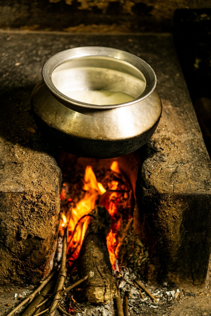 Boiling milk on a wood fire