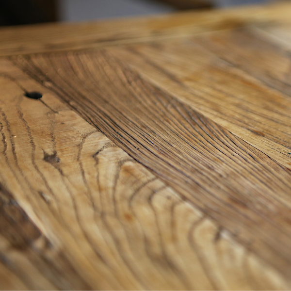 Wooden table with a protective coating