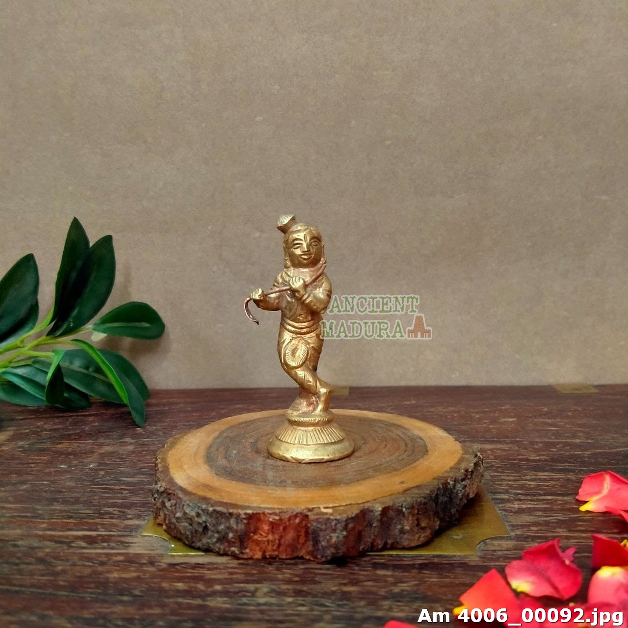 Brass krishna statue