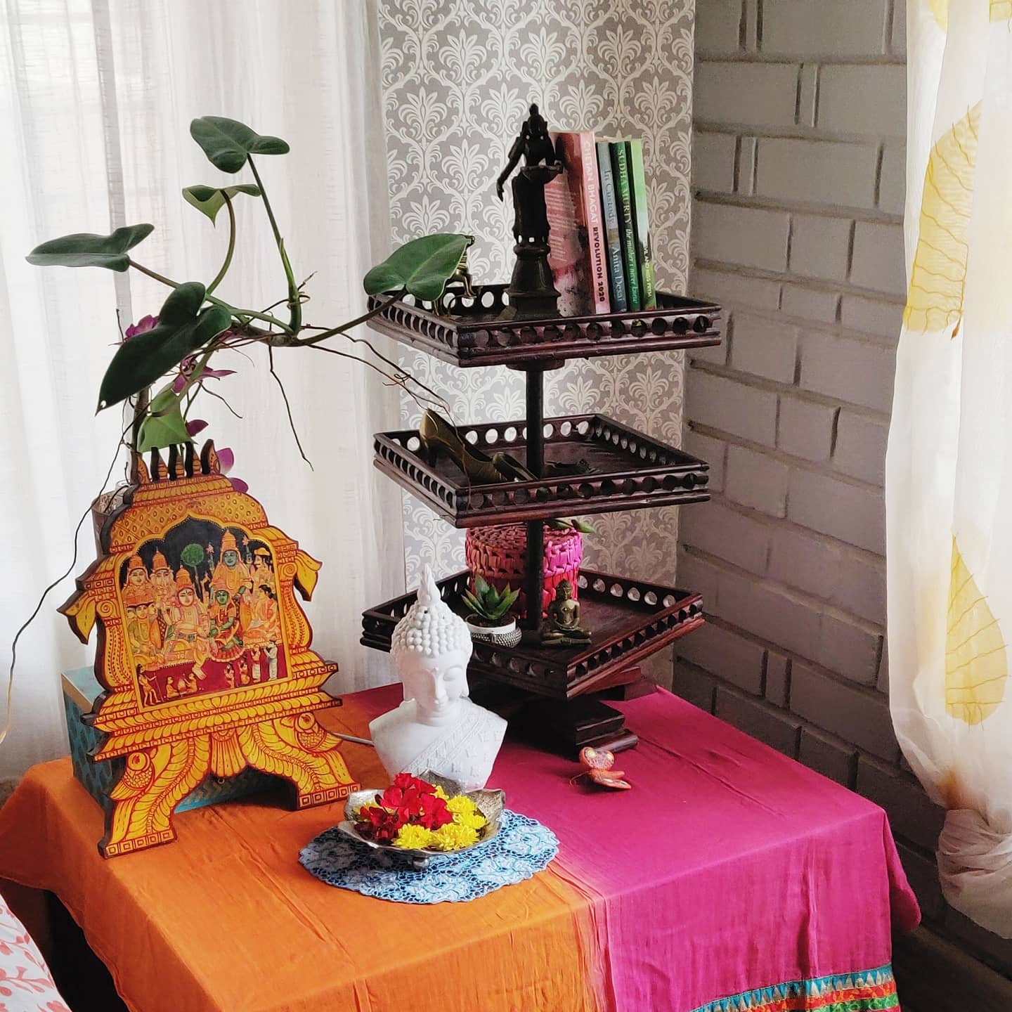 Antique Bedroom Decor Ideas with Shobha Ramesh's Tanjore Panel and statuettes displayed in the vignette