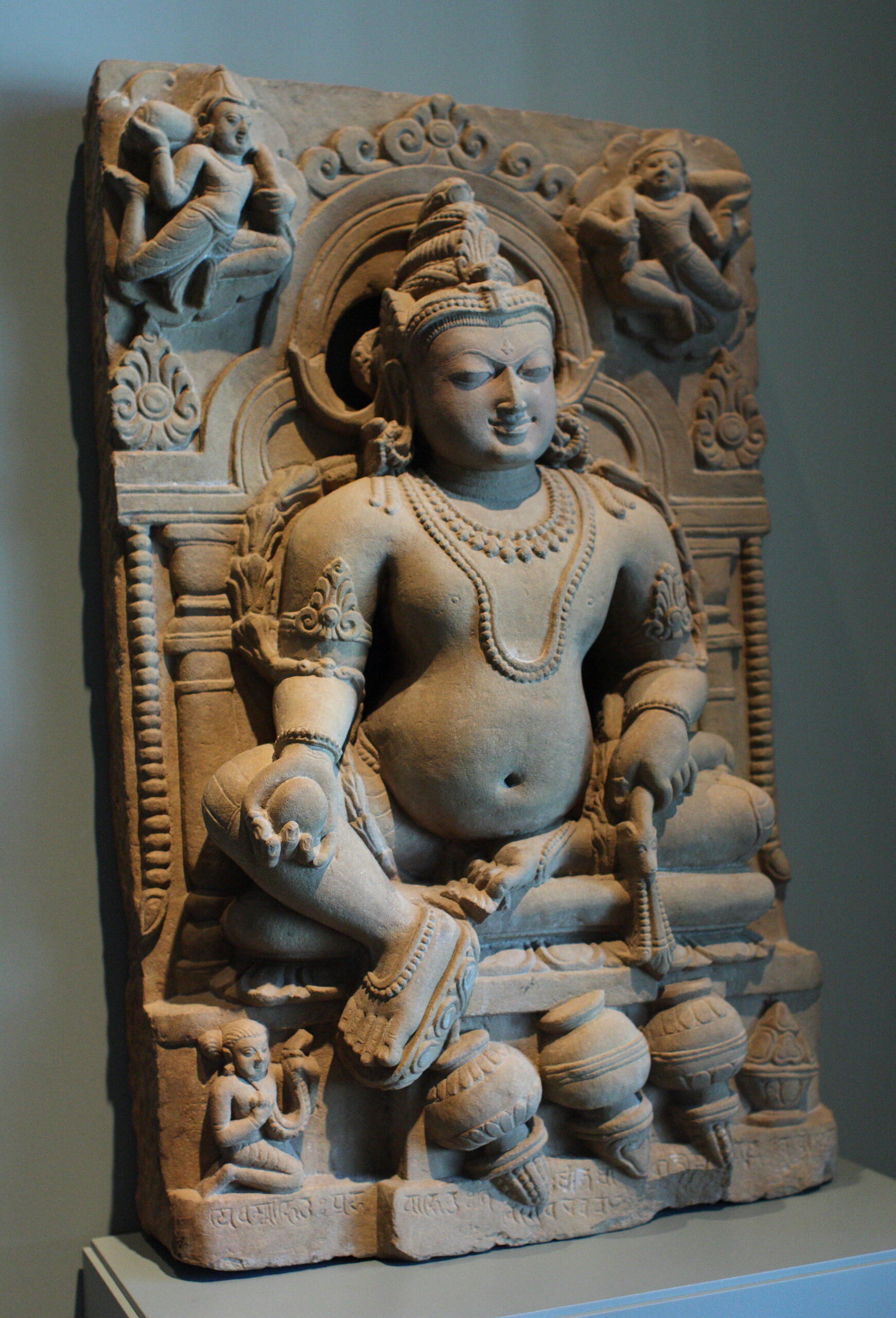 Jambhala, the Buddhist Kubera depicted similar to Kubera 