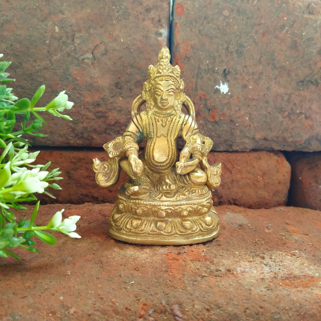 Brass Kuber Statue