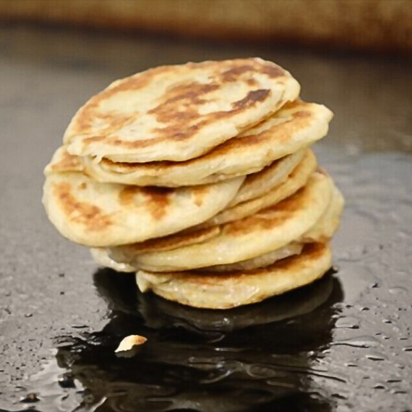 Bun Parotta on a hot oiled tawa