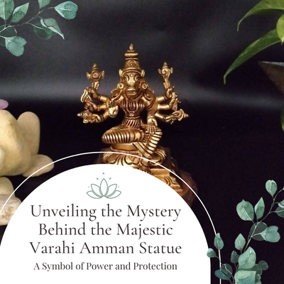A Varahi Amman Statue photographed with a black background with the blog title on the front.