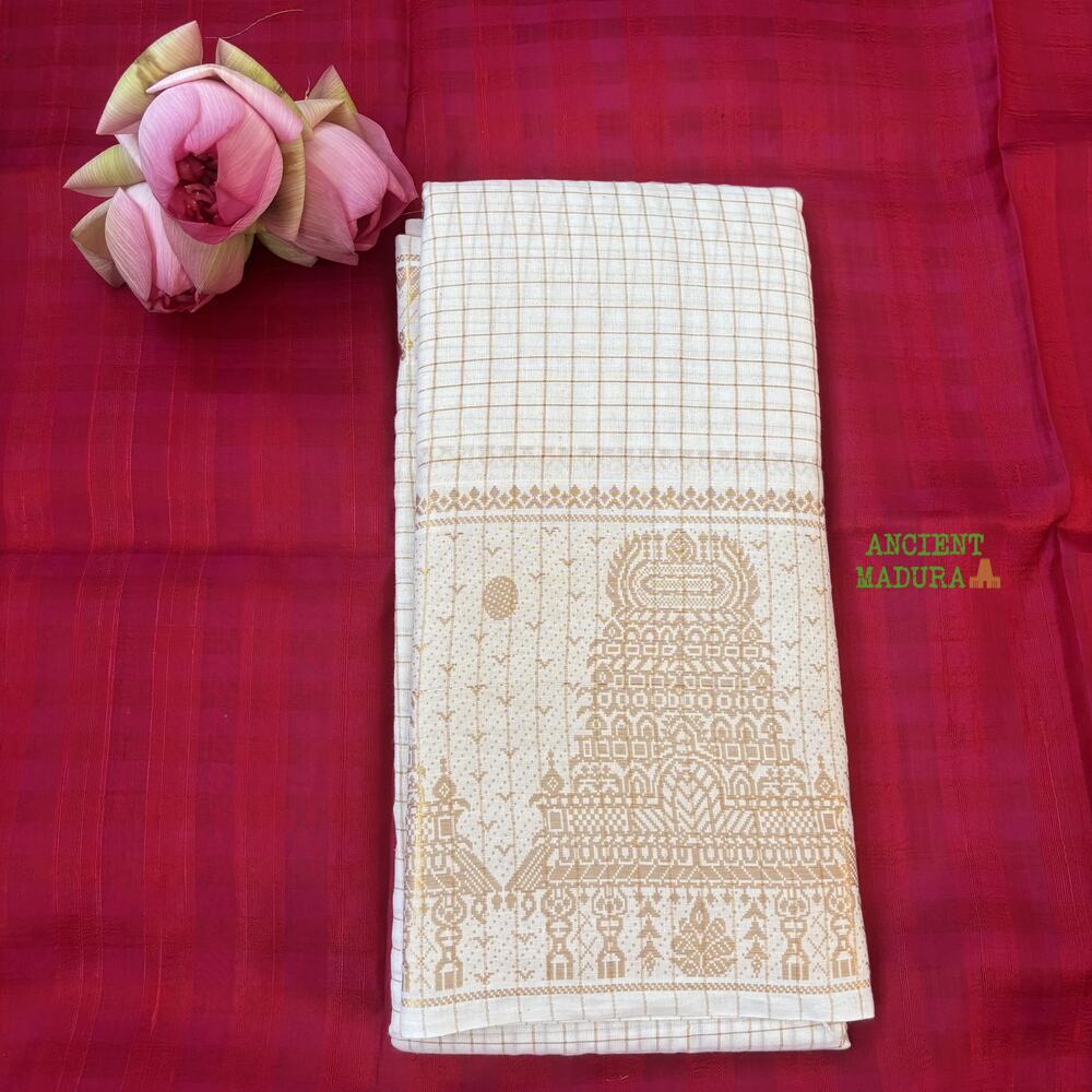 White premium gopuram border sungudi saree — pure white cotton with gold zari check lines and ornate temple motif border