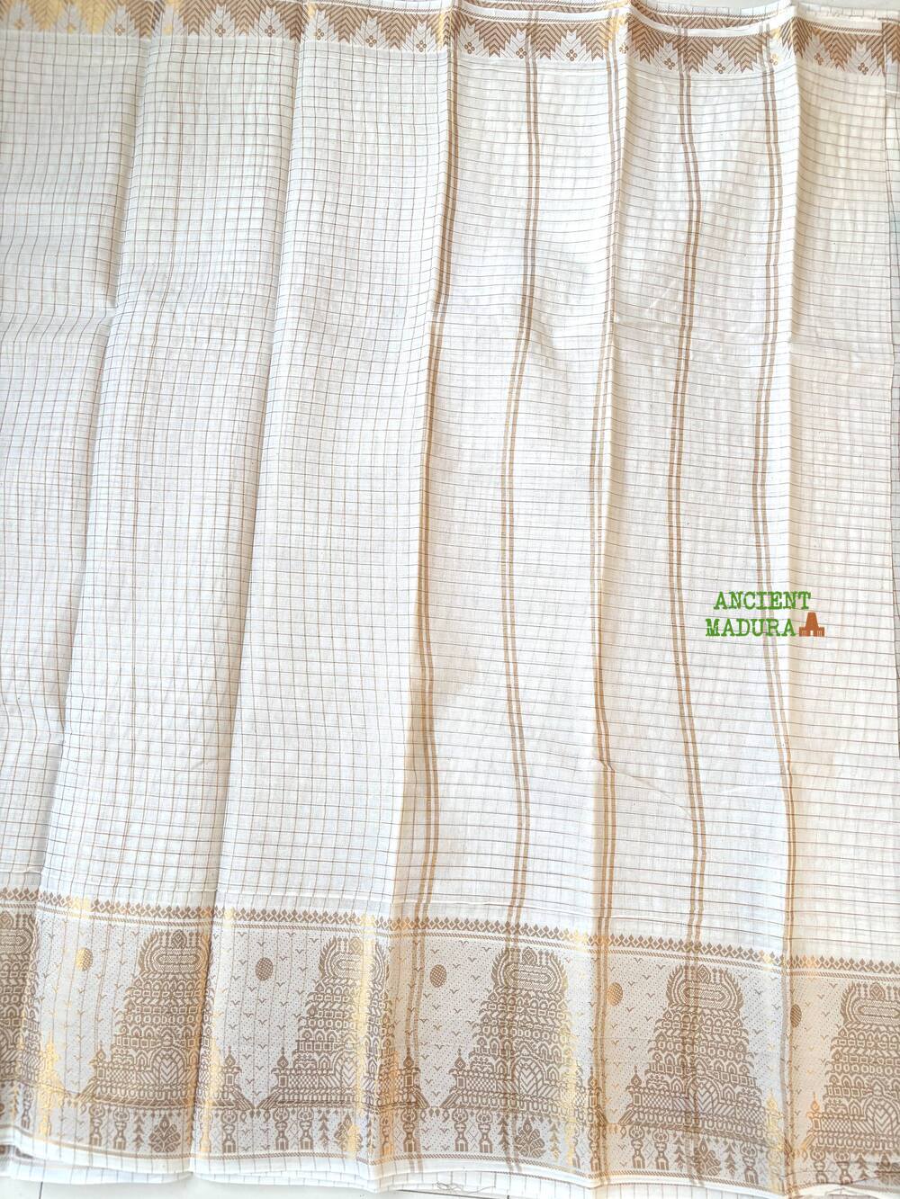 White premium gopuram border sungudi saree — pure white cotton with gold zari check lines and ornate temple motif border