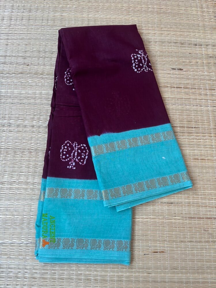 Dark brown premium 120 count batik sungudi cotton saree with white butterfly motif, turquoise Rettapet zari border, attached blouse, 90cm