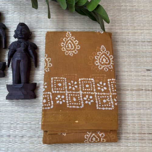 Mustard sungudi batik saree with cream paisley motifs and chequered floral square border