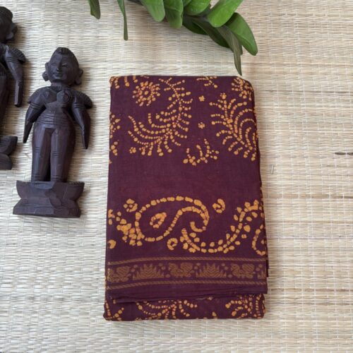Brown sungudi batik saree with yellow fern motifs, mango border and diamond floral pallu