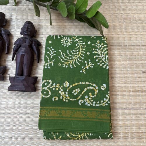 Leaf green sungudi batik saree with white and gold fern motifs, mango border and diamond floral pallu