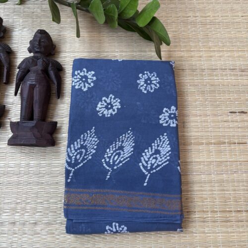 Slate blue sungudi batik saree with white peacock feather motifs and gold zari border