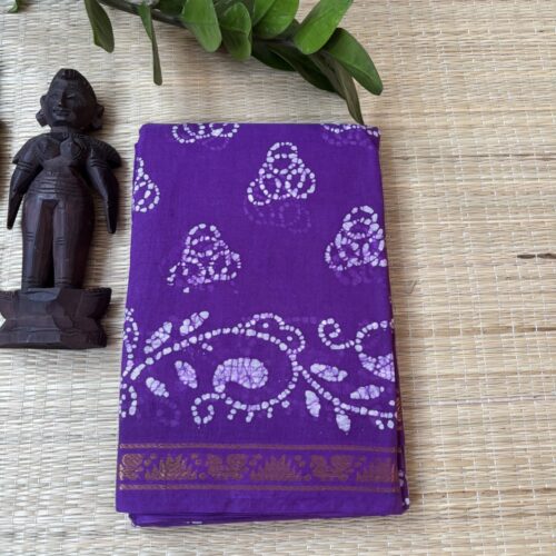 Purple sungudi batik saree with lilac tricircle cluster motifs, mango border and elaborate vine pallu