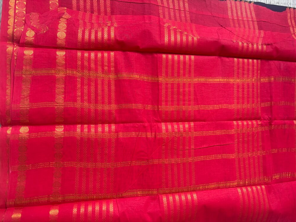 Coffee brown Neli Velthari sungudi saree with bright red Rettapet Rudraksha border, Madurai handcrafted cotton saree