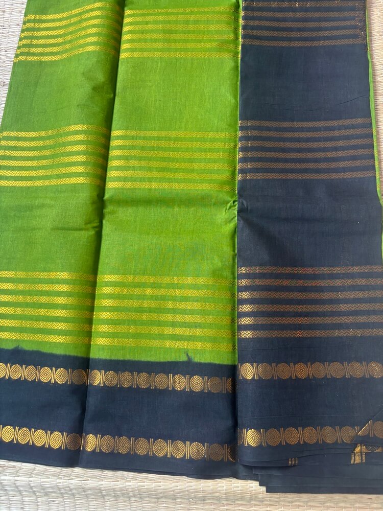 Leaf green Neli Velthari sungudi saree with black Rettapet Rudraksha border, Madurai handcrafted cotton saree