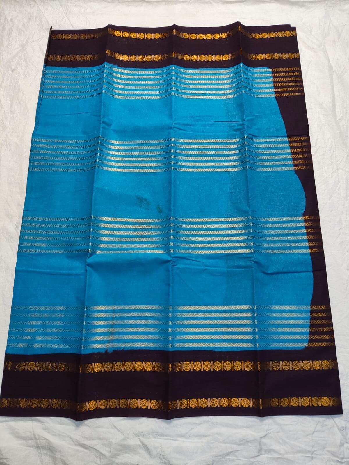 Turquoise Neli Velthari sungudi saree with coffee brown Rettapet Rudraksha border, Madurai handcrafted cotton saree