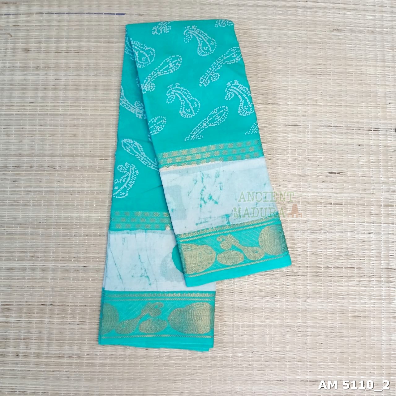 Turquoise Blue Musical Batik Sungudi Saree