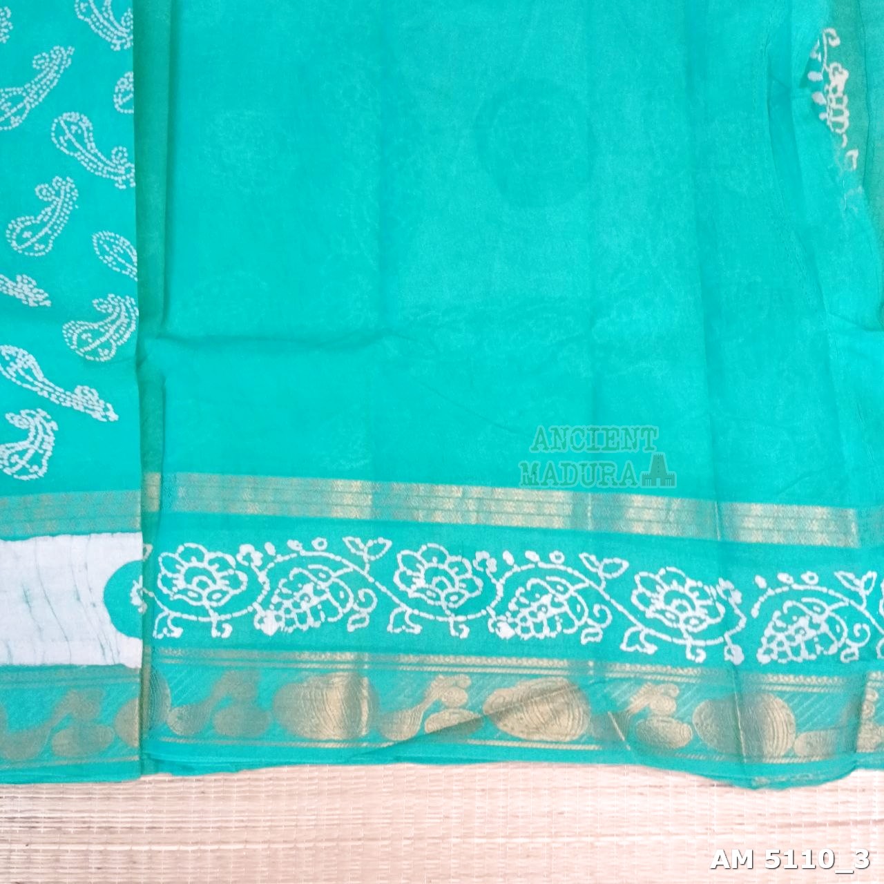Turquoise Blue Musical Batik Sungudi Saree