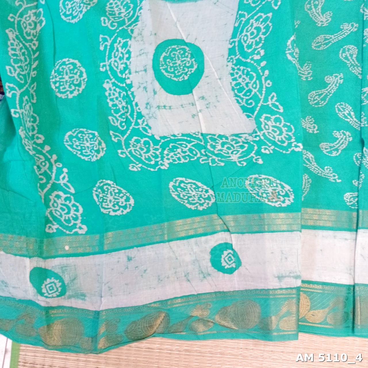 Turquoise Blue Musical Batik Sungudi Saree